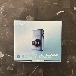 Canon PowerShot SD1300 IS ELPH 12.1MP 4x Optical ZoomDigitalkamera BITTE LESEN - Bild 1 von 2