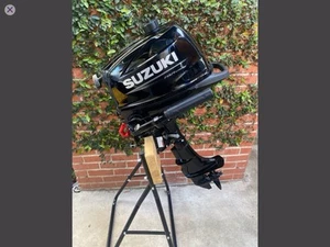 Suzuki Outboard Motor DF4A | 4HP 4-Stroke, 15 Inch Shaft, Tiller - Picture 1 of 15