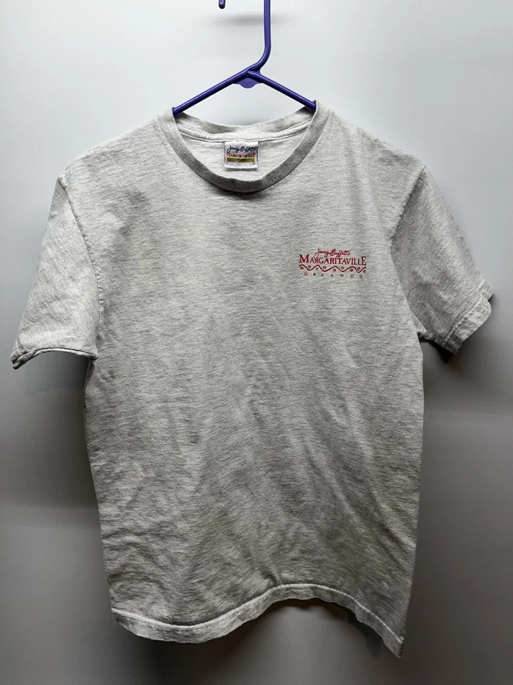CAMISETA VINTAGE JIMMY BUFFETT MARGARITAVILLE ORLANDO MEDIANA 1997 CABEZAS DE LORO Foto 1 de 4