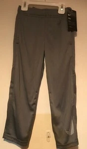 NWT NIKE DRI-FIT GIRL'S MEDIUM GRAY PANTS POLYESTER LIGHTWEIGHT SIZE 4 - Picture 1 of 2