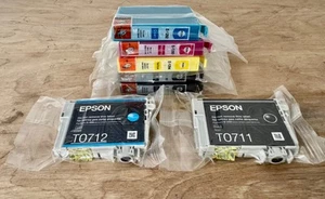 EPSON T0712 / T0711 SERIES INK CARTRIDGES + 5 COMPATIBLE CARTRIDGES - Picture 1 of 2