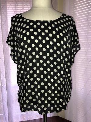 Top de seda a lunares blanco y negro VICTORIA’S SECRET XS Foto 1 de 4