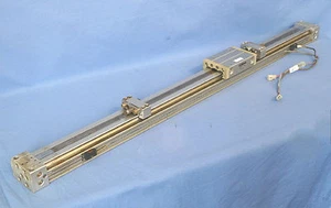 SMC MYC25G-669L-E73AL cilindro sin varilla con interruptores automáticos, carrera 26" - Imagen 1 de 3