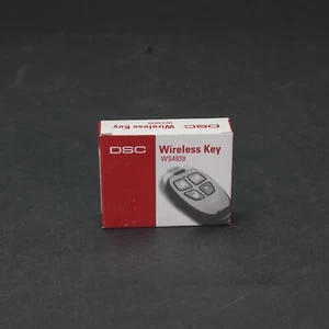 DSC WS4939 4-Tasten Funk Schlüsselanhänger Fernbedienung Key Fob Neu & Komplett - Bild 1 von 8
