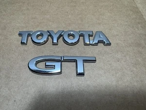 FREE SHIPPING OEM 00 01 02 03 04 05 TOYOTA CELICA GT REAR EMBLEM BADGE SET - Picture 1 of 4