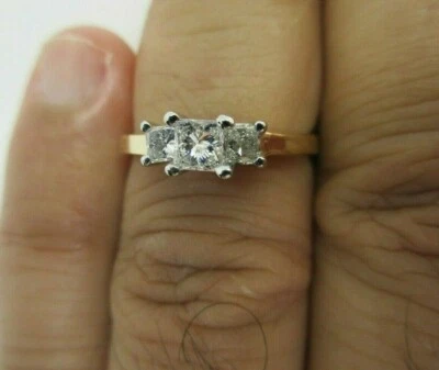 Anillo de tres piedras de diamantes y oro de 14K y platino diamante = valor 0,60 F-SI2/VS2 = $6.900 Foto 1 de 4