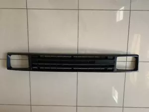 86-07/87 GRILLE BLACK WITH H/L DOOR.HYUNDAI EXCEL - Picture 1 of 3