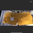 Gold Lacoste shorts size 4