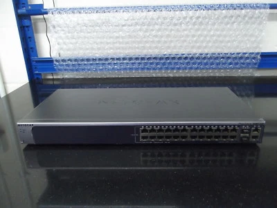 NetGear FSM726E V1H1 ProSafe 24-port Switch + 2 Combo 1Gig Interfaces - Image 1 of 4