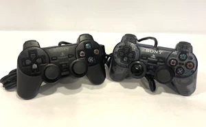 2 SONY PLAYSTATION DUALSHOCK 2 CONTROLLERS FOR PS2 SCPH-10010 FOR PARTS REPAIR - Picture 1 of 7