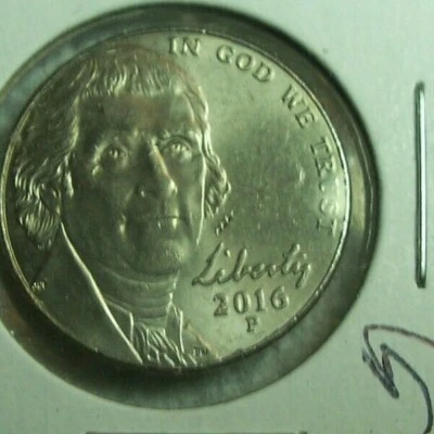 2016 P JEFFERSON NICKEL ERROR STRUCK THRU SCREW FRAGMENT FILEING IN FIELD - Image 1 of 4