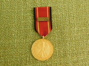 Bundeswehr Einsatzmedaille in gold mit Auflage EUFOR! - Bild 1 von 4