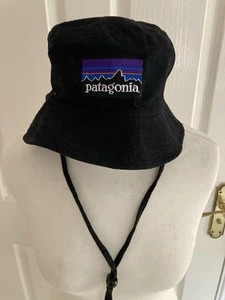 PATAGONIA BUCKET HAT ADJUSTABLE NECK STRAP BLACK WITH COLOURED LOGO VGC WOMENS - Picture 1 of 3