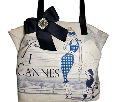 BOLSO DE MANO BRIGHTON MY FLAT IN LONDON MARGAUX CREMALLERA, CON JOYAS, LONA RECUBIERTA, CUERO  Foto 1 de 4