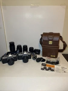 Pentax K1000 Kamera x2 mit SMC PENTAX, TOU/FIVE STAR, FOCAL MC, Anleitungen & Tasche - Bild 1 von 24