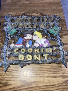 Vintage trivet Kissin' Wears Out Cookin' Dont, made in baxter springs kansas - Picture 1 of 6