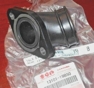 BOTA DE ADMISIÓN CARBURADOR SUZUKI QUAD RUNNER 250, KING QUAD 300 OEM, TUBO 13101-19B50 - Imagen 1 de 4