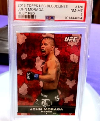 2013 TOPPS UFC BLOODLINES JOHN MORAGA  RUBY RED #7/8 126 PSA 8 - Image 1 of 4