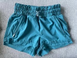 Athleta Girl Teal Athletic Shorts Size Large 12 Girls - Picture 1 of 3