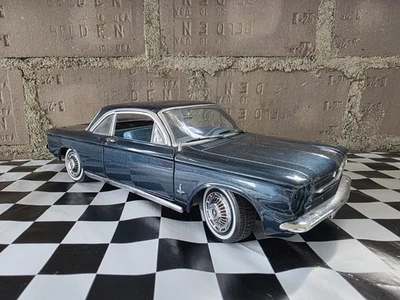 Coche modelo diecast Sun Star 1963 Chevy Corvair escala 1:18 azul 1482 Foto 1 de 4