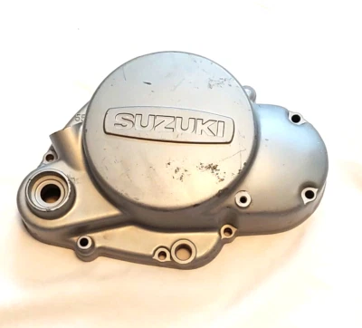 Cubierta de embrague Suzuki TS125 1971-1974, TC125, RV125 P/N 11482-28001 Foto 1 de 4