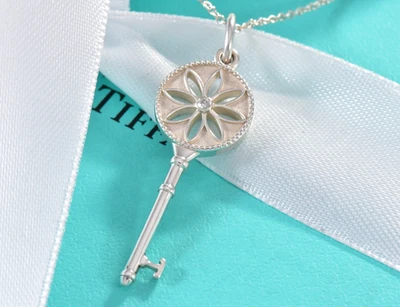 18.25" Tiffany & Co Silver Diamond 1.5" Daisy Flower Key Pendant Necklace Boxed - Image 1 of 4