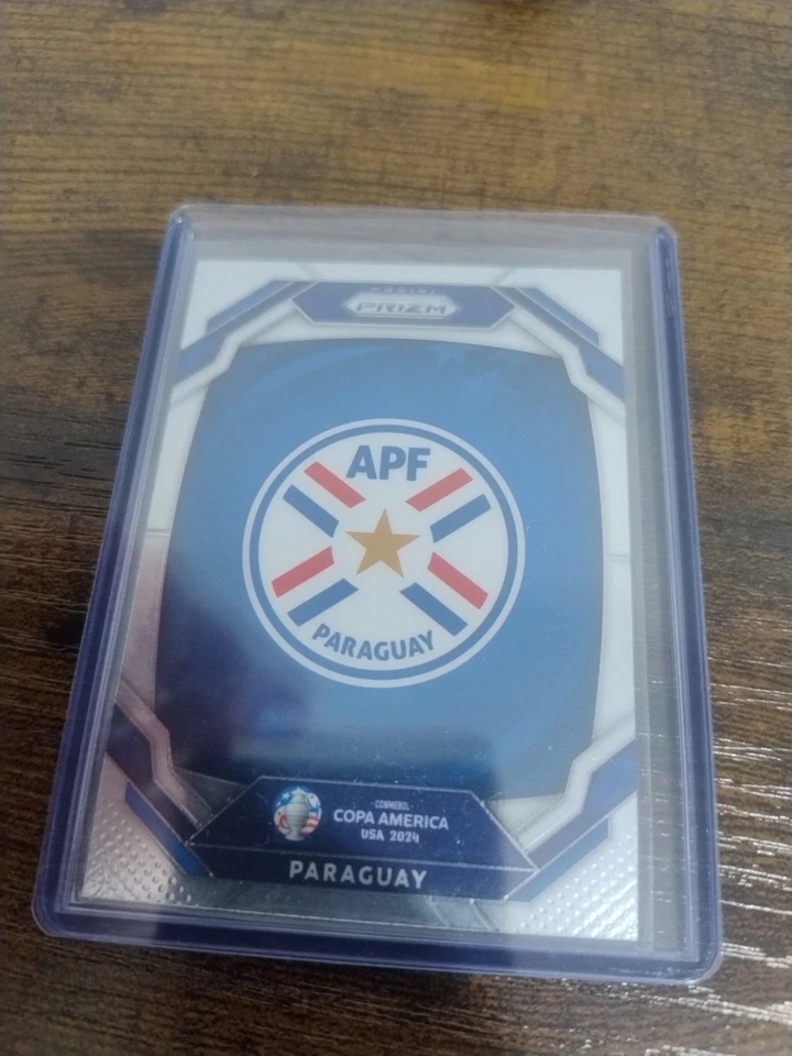 2024 Panini Prizm Conmebol Copa America Paraguay Badge #7 - Image 1 of 2