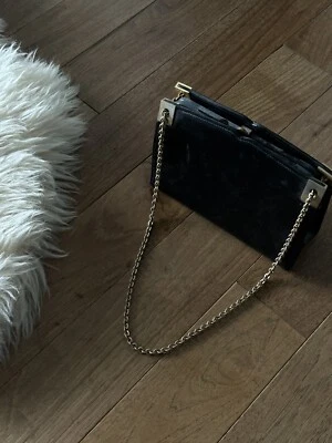 Bolso sin asas vintage Saks Fifth Avenue negro con cierre único, ornamentado, bolso expandible Foto 1 de 4