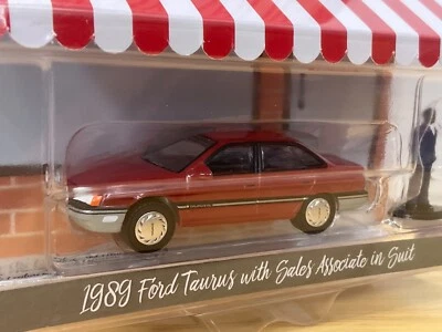 Ford Taurus GL 1989 Greenlight 1/64 con estuche Salesman Hobby Shop Series 13 nuevo Foto 1 de 4