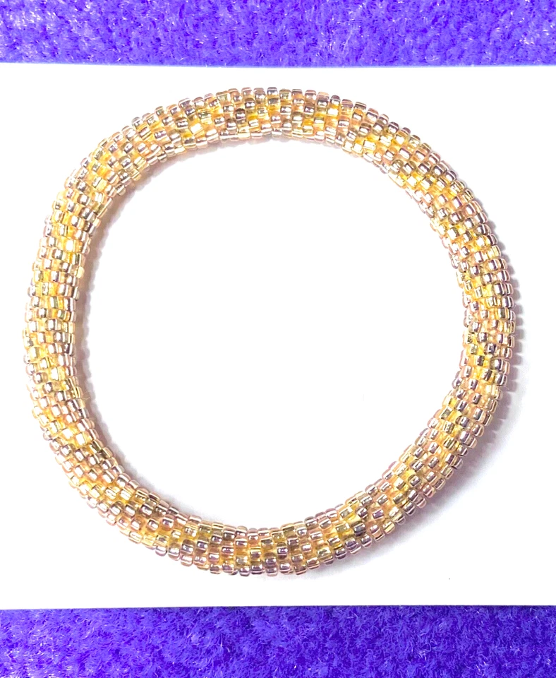 BRAZALETE/PULSERA CON CUENTAS DE VIDRIO TONOS DORADOS MARCA LUCKY EN MUY BUENA CONDICIÓN Foto 1 de 4