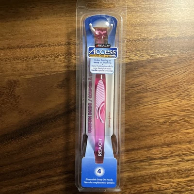 Reach Access Daily Flosser rosa con 4 cabezales de repuesto nuevo de 2003 Foto 1 de 3