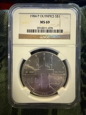 1984-P Olympics Silver Dollar Commemorative $1 NGC MINT STATE 69 MS 69 - Image 1 of 2