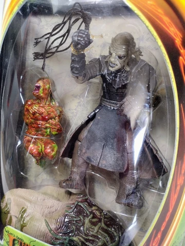 Lord of the Rings Orc Overseer With Newborn Uruk-Hai Action Figure And Dungeon Cover