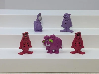 Juego de figuras borrador de picapiedra guijarros afrutados cereal Fred Barney Dino mamut Foto 1 de 4