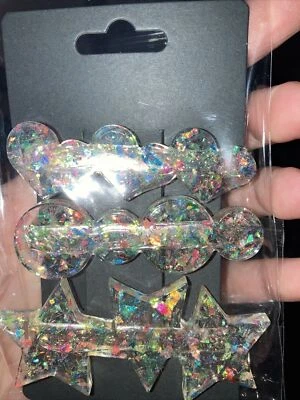 Juego de 3 pinzas para el cabello de resina plateadas. ENVÍO GRATIS Foto 1 de 2