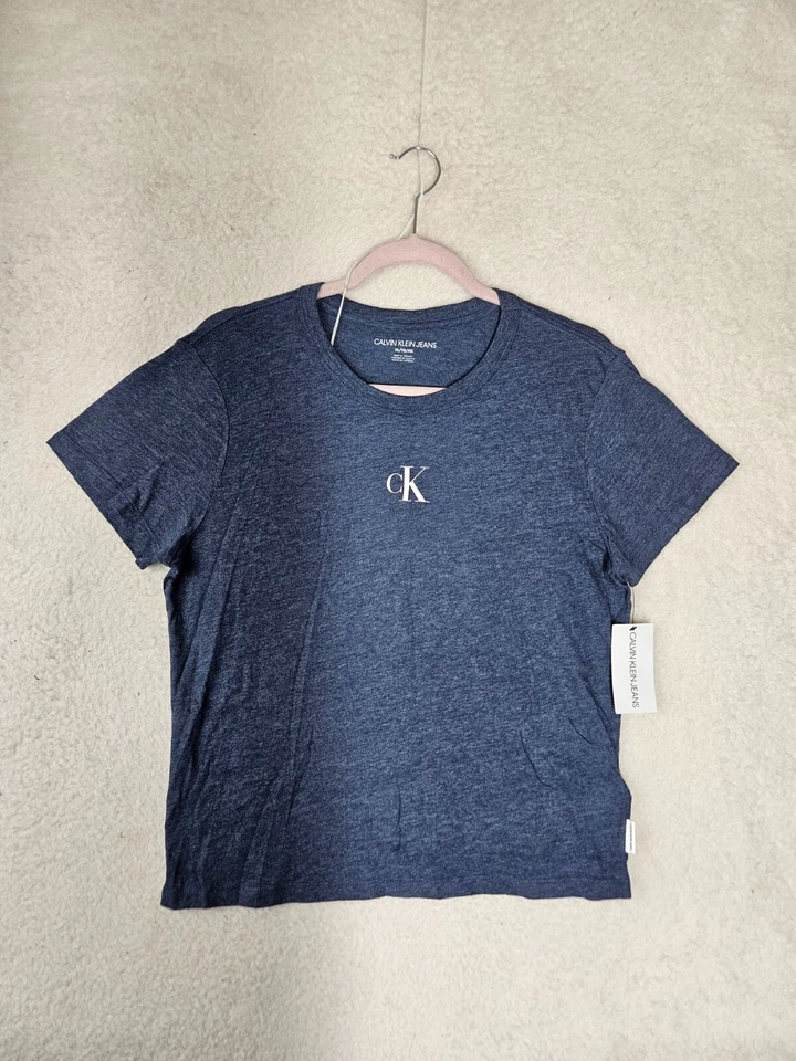 Camisa informal de manga corta de mezcla de algodón azul extra grande de Calvin Klein para niños Foto 1 de 4