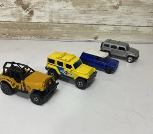 Lote Mixto De 4 Coches Matchbox Jeep Rescue Austin Mini Hummer Más - Imagen 1 de 24