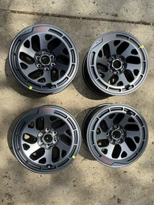 4 New 2024 Nissan Frontier Pro 4X Factory OEM 17” RIMS ONLY - Bild 1 von 24