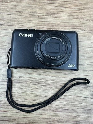 CÁMARA DIGITAL CANON POWERSHOT S90 NEGRA SOLO PARA REPUESTOS O REPARACIÓN-Leer descripción Foto 1 de 4