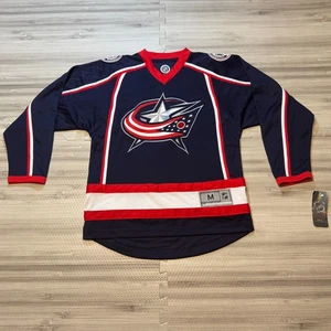 Neu mit Etikett Columbus blaue Jacken Reebok Jugend Trikot Größe Medium - Bild 1 von 3