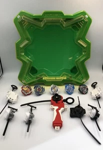 Beyblades Dueling Stadium, lanciatori, trottole e pezzi di ricambio - Foto 1 di 7