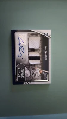 2022 Panini Absolute-Tools of the trade Signatures Cal Raleigh TT2S- CR 85of99 - Image 1 of 2