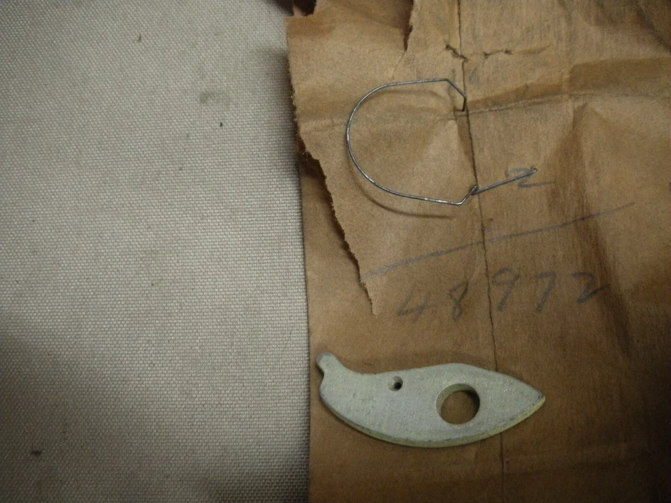 NOS OEM REMINGTON CHAINSAW DOG AND SPRING  48972 R1 - Image 1 of 1