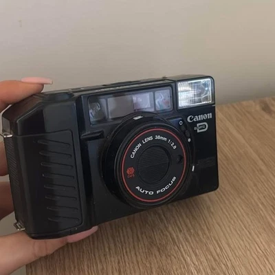 Cámara fotográfica vintage Canon Sure Shot cuarzo fecha 38 mm película japonesa AAA Foto 1 de 3