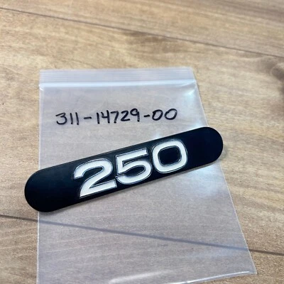 YAMAHA OEM NOS EXHAUST GUARD EMBLEM / 311-14729-00-00 / 1972-1973 DT2 DT3 DT250 - Image 1 of 2