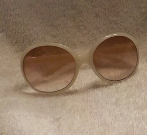 Girl's cream sun glasses with bow on side, light brown lenses - Picture 1 of 4