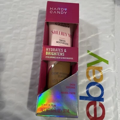 Crema hidratante tintada Hard Candy 510 Sheerly Me hidrata e ilumina 1 oz Foto 1 de 2