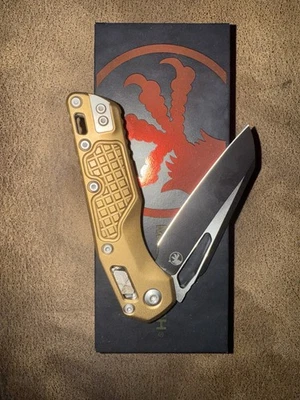 MSI® S/E NEGRO ESTÁNDAR ALUMINIO FRAG BRONCEADO (210-1FRTA) Plus Olight I3T2EOS Foto 1 de 3