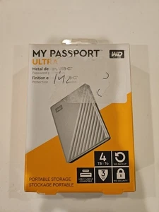 Disque dur externe portable Western Digital My Passport ULTRA 4 To - Argent - Photo 1/3