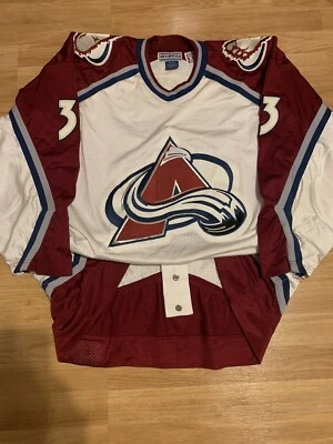 Camiseta Inaugural Starter Auténtica Patrick Roy Colorado Avalanche Blanca Casa 54 Foto 1 de 4